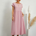 Light pink midi casual dress with short sleeves and gathered waist, front view