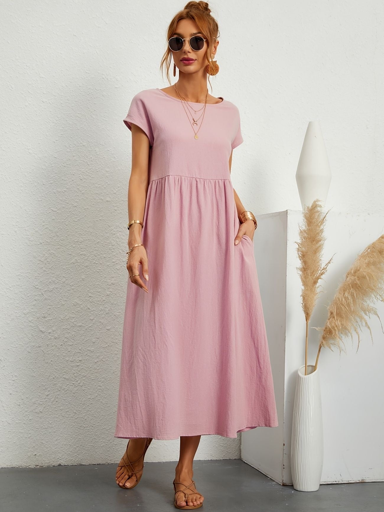 Light pink midi casual dress with short sleeves and gathered waist, front view