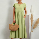 Light green midi casual dress with short sleeves and gathered waist, front view