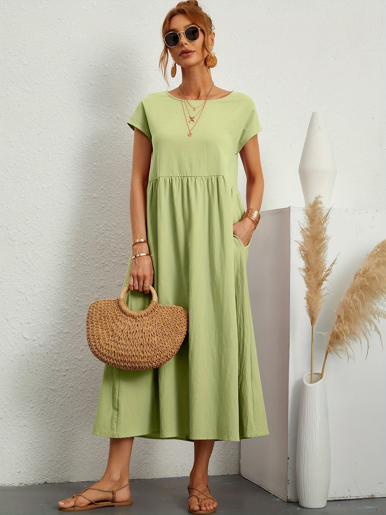 Light green midi casual dress with short sleeves and gathered waist, front view