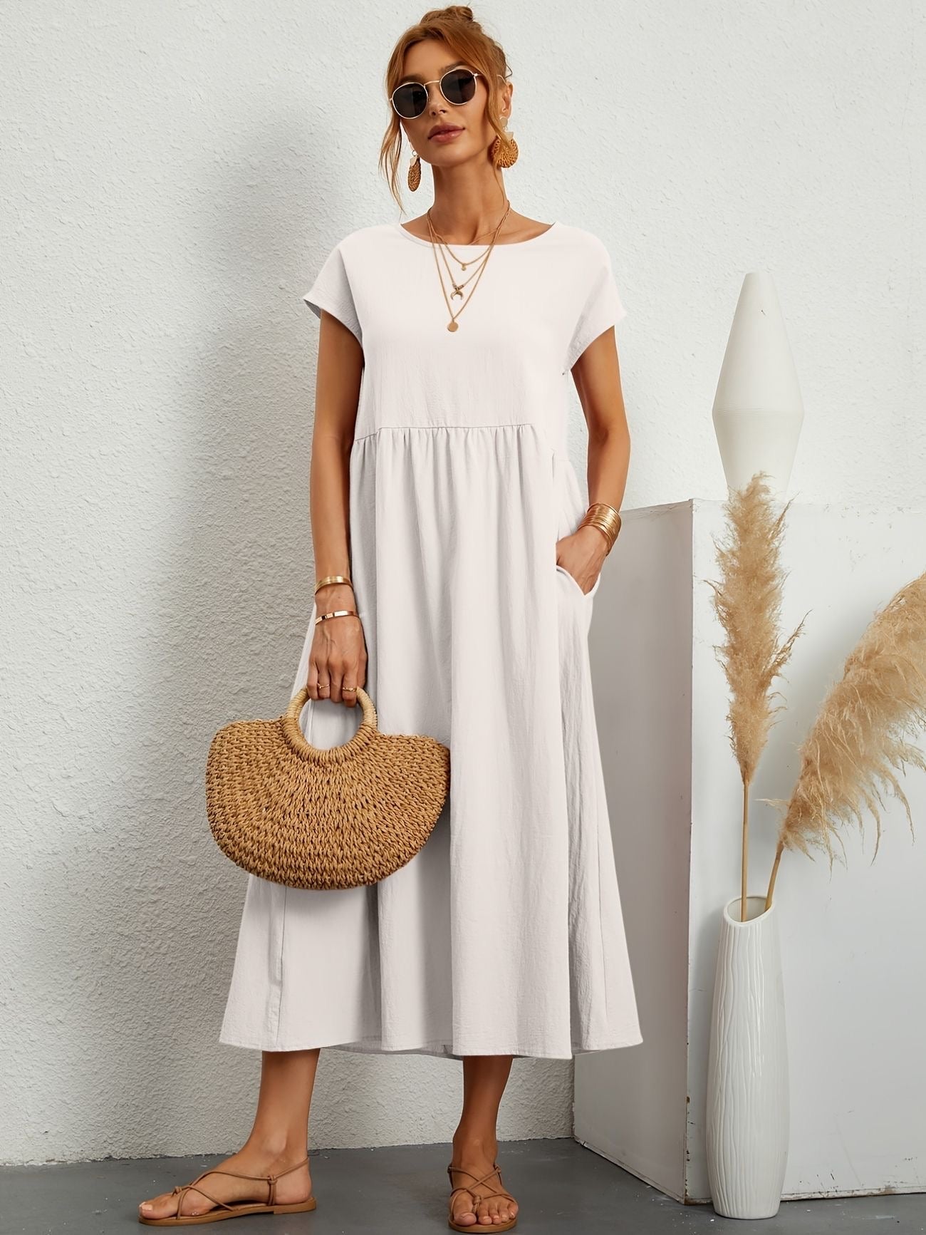 White midi casual dress with short sleeves and gathered waist, loose flared skirt