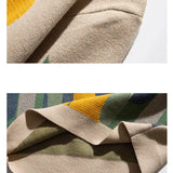Beige crew pullover collar and hem closeup with ribbed knit trim