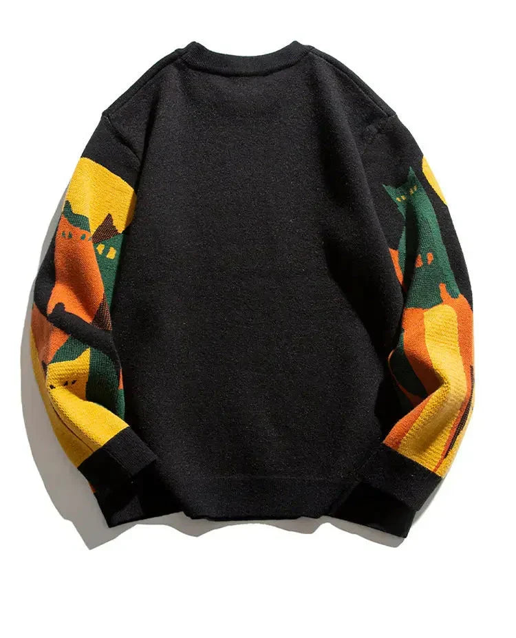 Black crew pullover with solid back and multicolor striped sleeves, ribbed hem