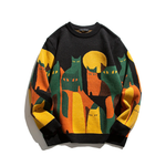 Black cat graphic crew pullover with multicolor city scene and ribbed cuffs