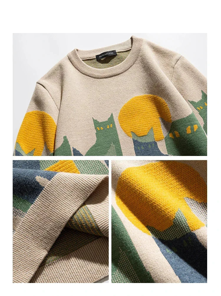Beige cat crew pullover closeup: ribbed collar, striped cuffs, knit texture details