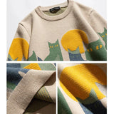 Beige cat crew pullover closeup: ribbed collar, striped cuffs, knit texture details
