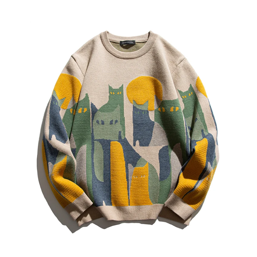 Beige cat graphic crew pullover with multicolor city scene and ribbed cuffs