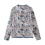 Women's patterned long-sleeve jacket with crew neck and blue trim at neckline and hem