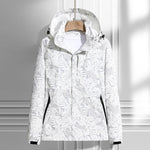 Lightweight rain jacket with hood, leaf print, front zipper, white with dark trim