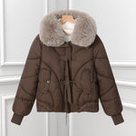 Brown short puffer pilot jacket with large faux fur collar and drawstring hem.