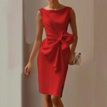 Red satin sleeveless dress with draped waist and large bow