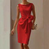 Red satin sleeveless dress with draped waist and large bow