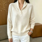 Women’s cream button-front V-neck long-sleeve sweater, ribbed cuffs and hem.