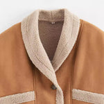 Camel short jacket detail: sherpa-trimmed V collar and button placket