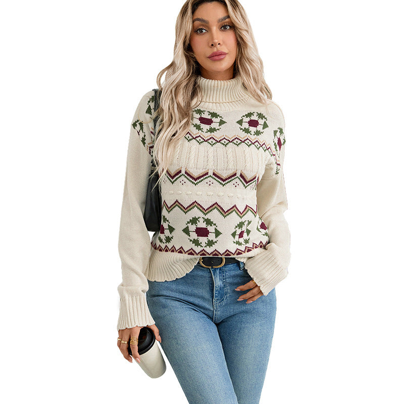 Cream knit turtleneck sweater with fair isle reindeer and zigzag stripe pattern