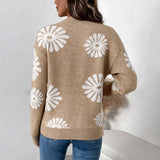 Women's khaki crewneck floral sweater with white daisy pattern, long sleeves (back view)