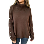 Oversized dark brown knit turtleneck pullover with buttoned cuffs, long sleeves