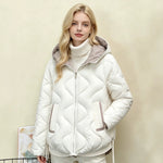 Offwhite quilted short jacket with hood, heart stitching, zip front, snap cuffs and pockets.