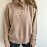 Taupe knit long-sleeve pullover with buttoned stand collar and ribbed sleeve cuffs