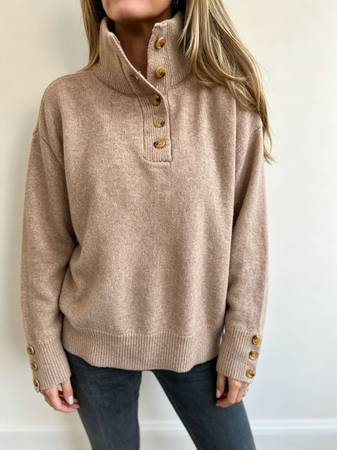 Taupe knit long-sleeve pullover with buttoned stand collar and ribbed sleeve cuffs