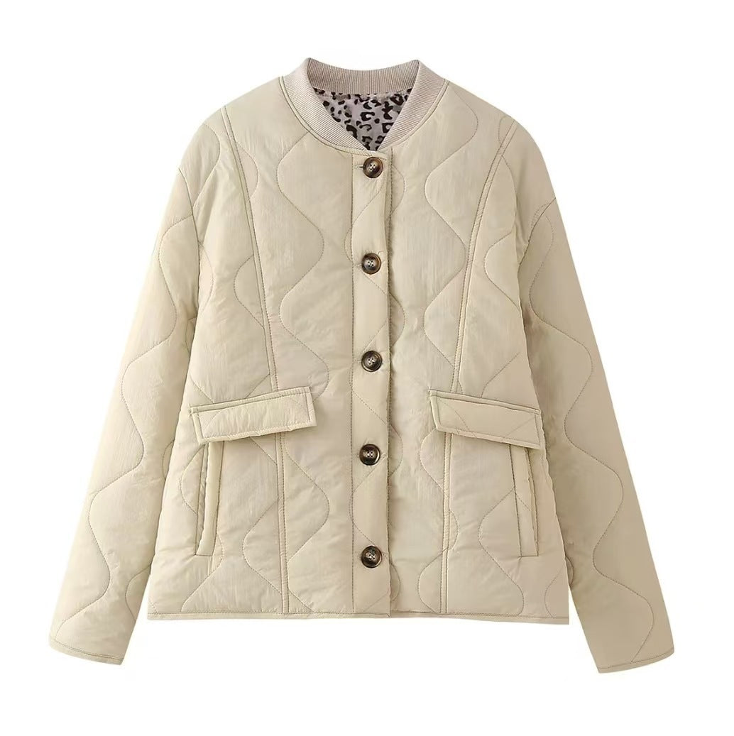 Quilted button-front jacket with pockets and round neckline, cream