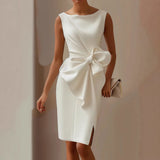 White satin sleeveless dress with draped waist and oversized bow