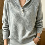 Women’s gray button-front V-neck long-sleeve sweater, knit with ribbed cuffs.