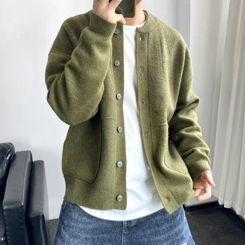 Olive soft pull cardigan with button front, long sleeves, and patch pockets