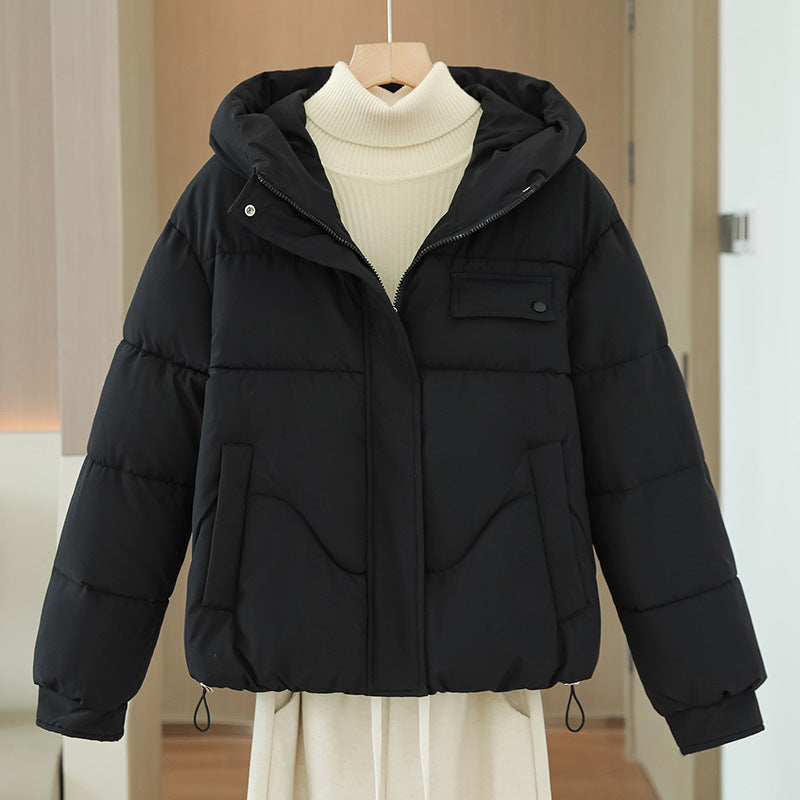 Women’s short quilted hooded jacket in black with hidden front zipper and chest pocket