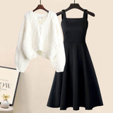 Two-piece set: white cable V-neck knit sweater with black fishtail skirt