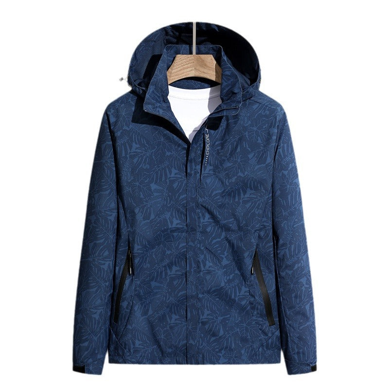 Lightweight rain jacket with hood, leaf print, front zipper, navy with dark trim