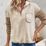 Fleece quarter-zip pullover with chest pocket and stand collar, cream and tan