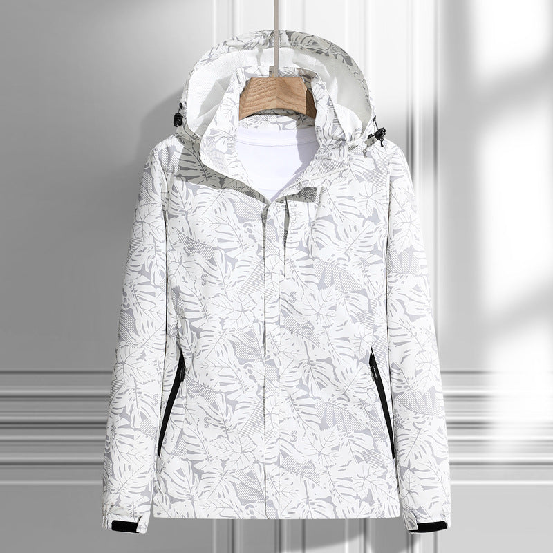 Lightweight rain jacket with hood, leaf print, front zipper, white with dark trim