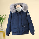 Navy padded bomber jacket with faux-fur hood, zip-front, and ribbed cuffs