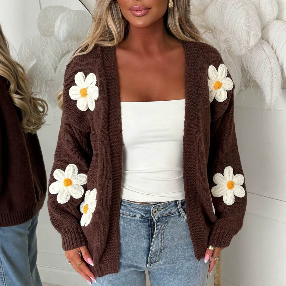 Women’s oversized brown long-sleeve cardigan with white daisy appliqués