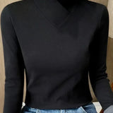 Women’s black roll-neck long-sleeve sweater with V-shaped collar detail