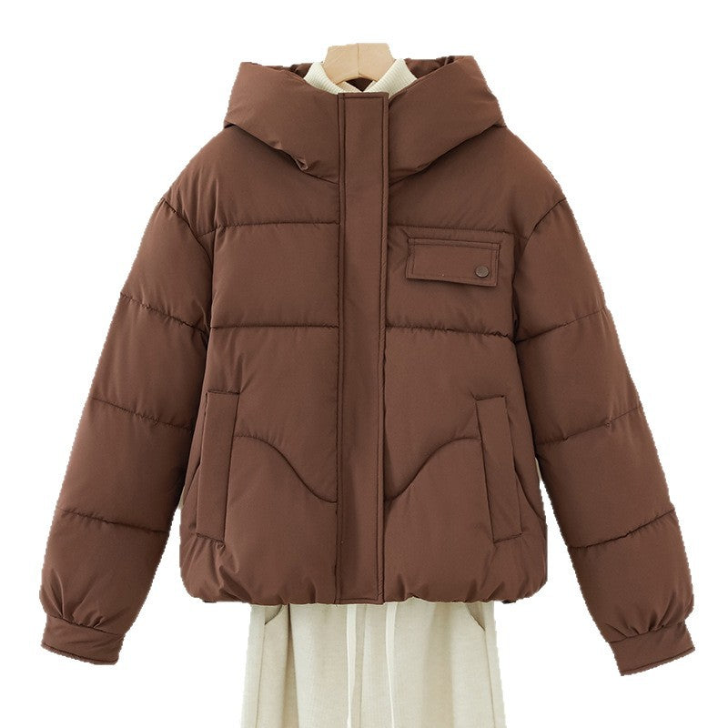 Women’s short quilted hooded jacket in brown, full front view, hidden zipper and chest pocket