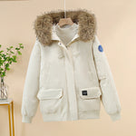 Offwhite padded bomber jacket with faux-fur hood, zip-front, and flap pockets