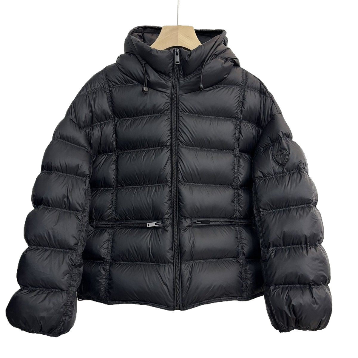 Short padded hooded thermal jacket in black with full-zip front and side zip pockets