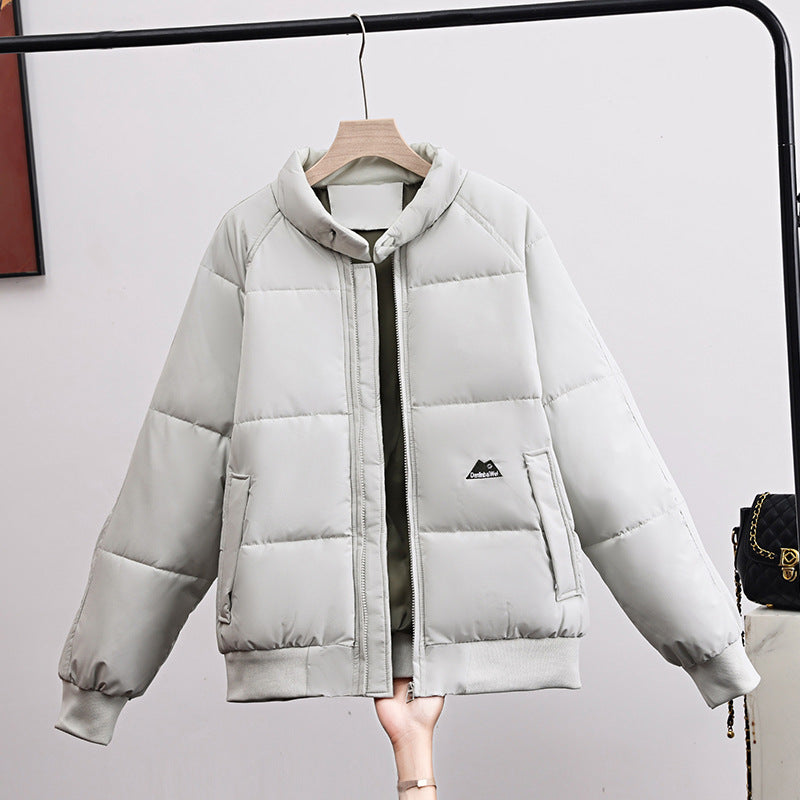 Women’s short quilted bomber jacket, light gray, full-zip with high stand collar and side pockets