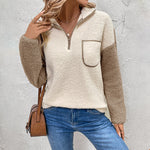 Fleece half-zip pullover with chest pocket, cream body, tan side sleeves