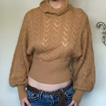 Khaki cropped knit turtleneck sweater with cable pattern, long sleeves, front buttons
