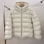 Short padded hooded thermal jacket in off-white with full-zip front and side zip pockets
