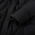Black parka collar and sleeve close-up with ribbed inner cuff and button detail