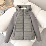 Women’s light hybrid quilted jacket with hood, gray, zip-up front on chair