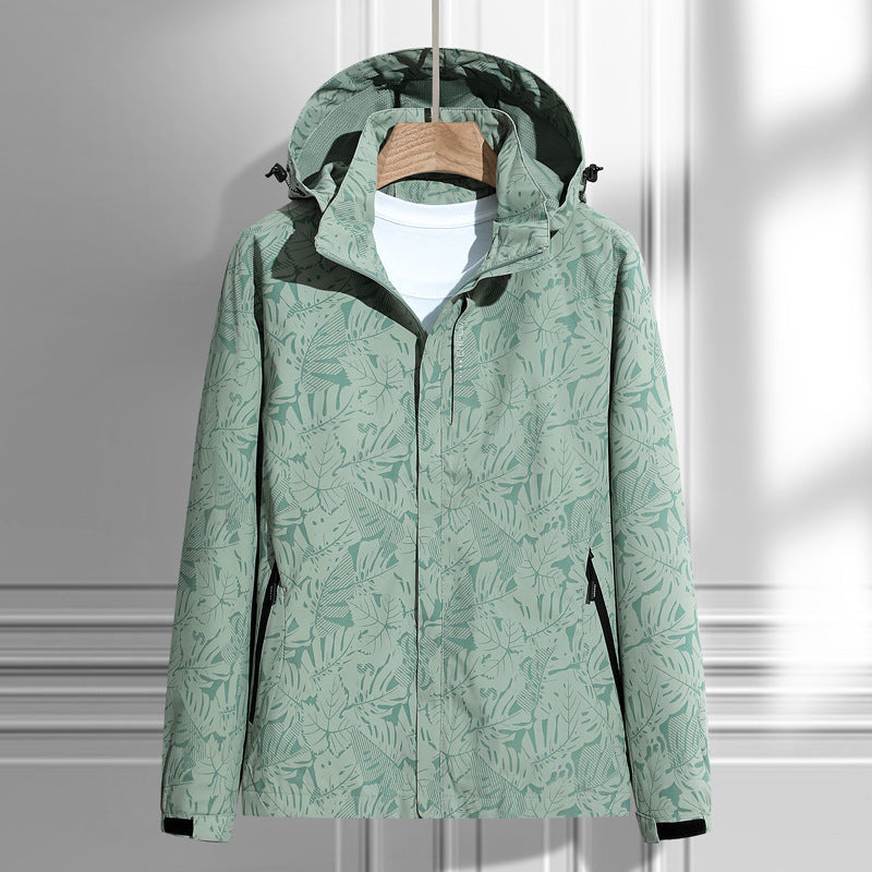 Lightweight rain jacket with hood, leaf print, front zipper, green with dark trim