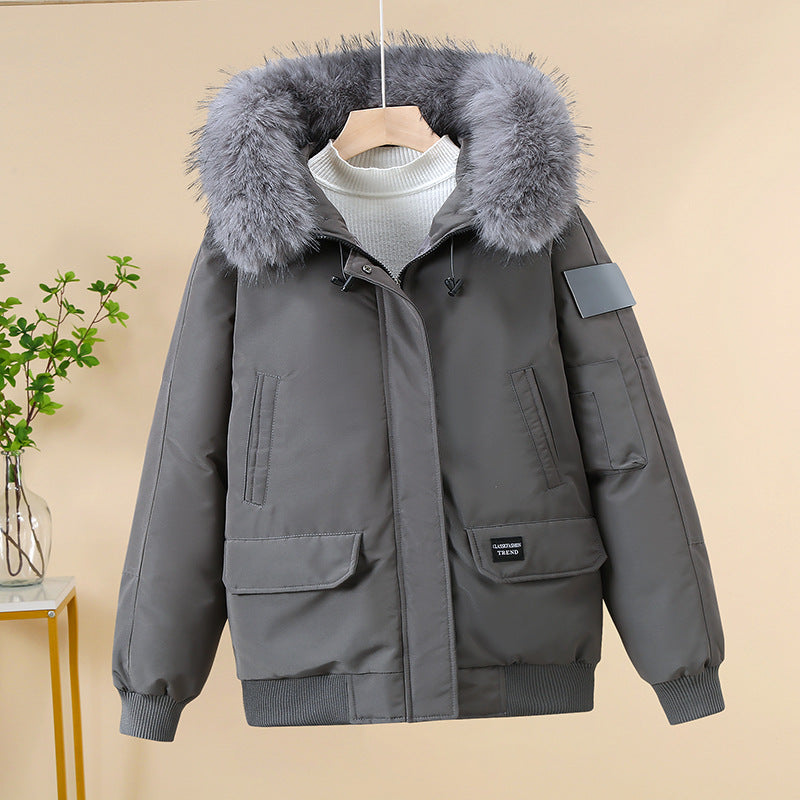 Gray padded bomber jacket with faux-fur hood, zip-front, and flap pockets