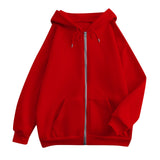 Red oversized zip-up hoodie with hood, kangaroo pockets, and ribbed cuffs