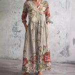 Floral long dress in beige with V-neck and three-quarter sleeves, gathered waist