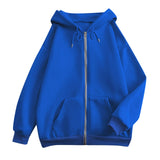 Blue oversized zip-up hoodie with hood, kangaroo pockets, and ribbed cuffs